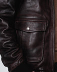 Men’s modern aviation jacket made from 100% full grain sheep skin leather and with a removable shearling collar.