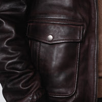 Men’s modern aviation jacket made from 100% full grain sheep skin leather and with a removable shearling collar.